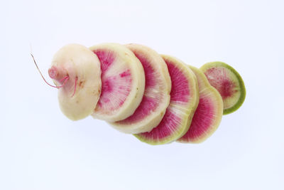 Close-up of fruits against white background