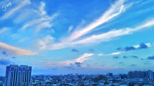 Cityscape against blue sky