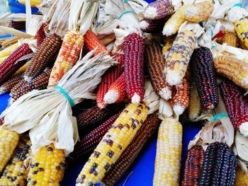 Corns at market stall for sale