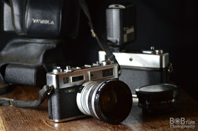 Close-up of camera on table