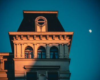 Low angle view of building against sky at night