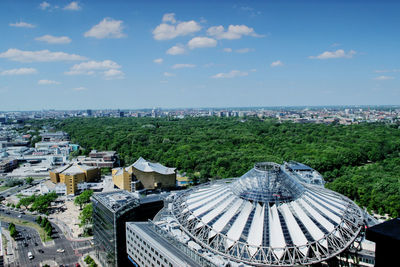 View of cityscape against blue sky