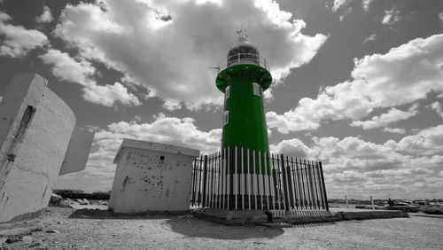 Built structure against cloudy sky