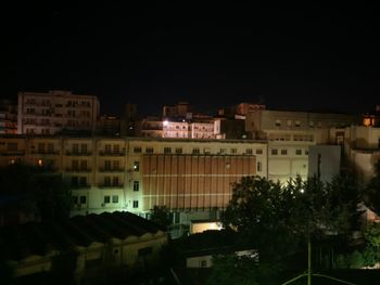 Exterior of buildings in city at night