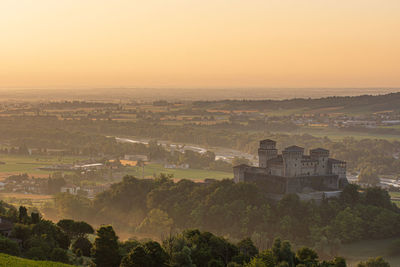 High angle view of castle against sky during sunset