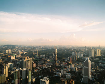 High angle view of buildings against sky in city