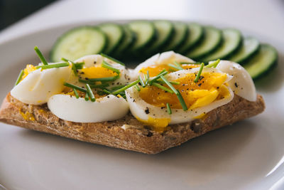 Close-up of breakfast in plate on table