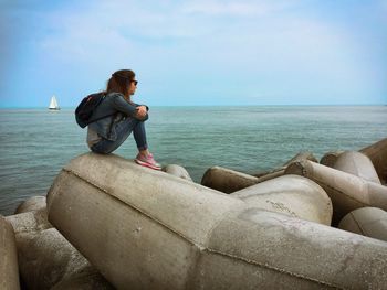 Woman sitting on beach