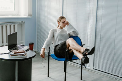 Multitasking skills employers, work burnout, tired at work. busy young blonde businesswoman with