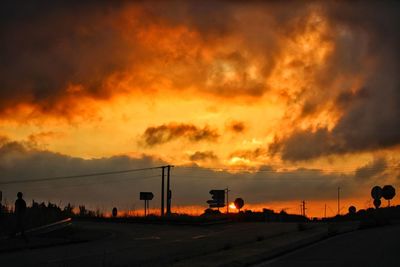 Scenic view of dramatic sky during sunset