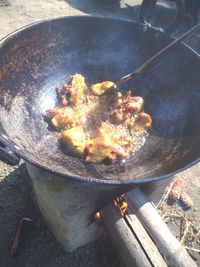 High angle view of meat on barbecue grill