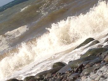 Waves splashing on rocks