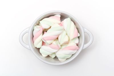 Close-up of cake against white background