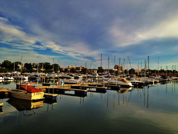 Boats moored at harbor