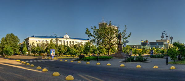 Azov avenue in berdyansk, ukraine, on an early summer morning