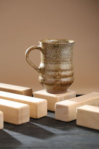 Close-up of coffee cup on table