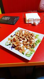 High angle view of food served on table