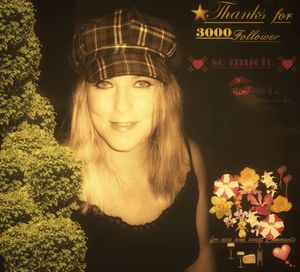 Portrait of young woman with flowers