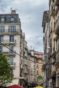 Low angle view of buildings against sky