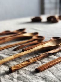 Close-up of wooden spoons on table