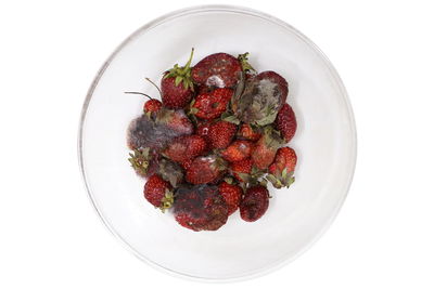 High angle view of strawberries in plate