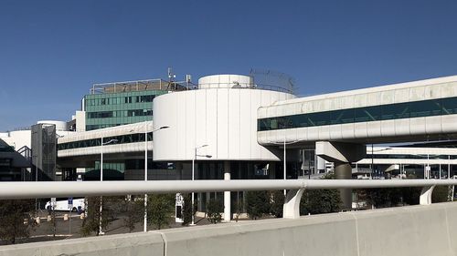 Low angle view of modern buildings against clear sky