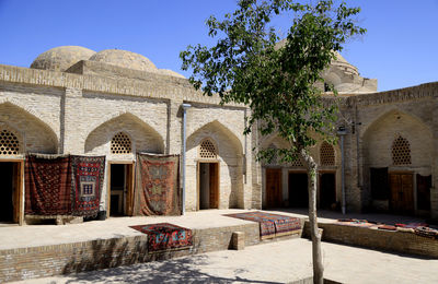 Low angle view of historic building against clear sky