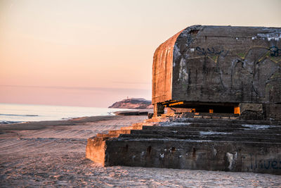 Scenic view of sea against sky at sunset