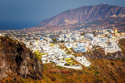 Aerial view of landscape with mountain range in background