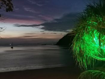 Scenic view of sea against sky at sunset