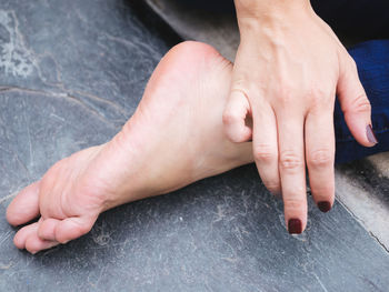 Close-up of hand and foot