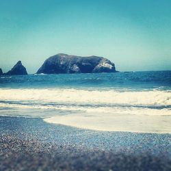 Scenic view of sea against clear sky