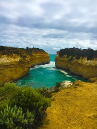 View of the sea, waves, beach and cloudy sky at the twelve apostles, victoria