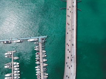 High angle view of sea by pier