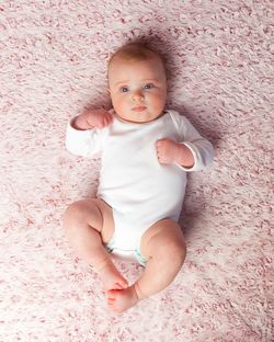 Portrait of cute baby girl at home