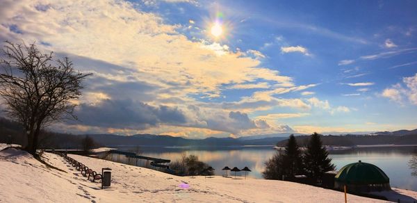 Scenic view of mountains against sky during winter