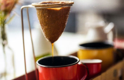 Close-up of coffee cup on table