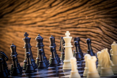 Close-up of chess pieces on board