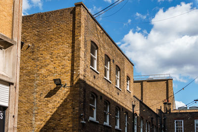 Low angle view of old building against sky