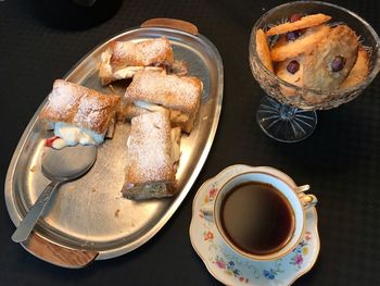 High angle view of coffee cups on table