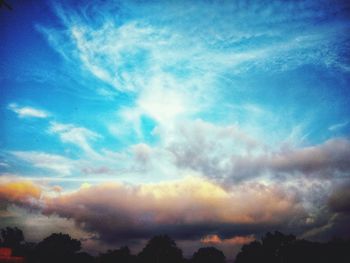 Low angle view of dramatic sky during sunset