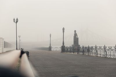 View of street against sky in city