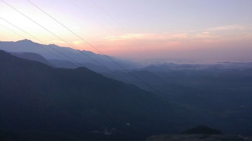 Scenic view of mountains at sunset