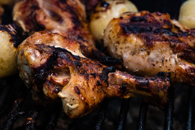 Close-up of meat on barbecue grill