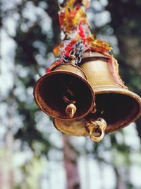 Low angle view of bell hanging in temple