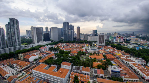 High angle view of buildings in city against sky