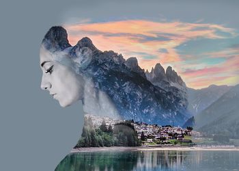 Double exposure image of woman with mountain 