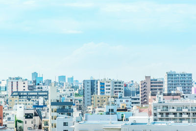 High angle view of buildings against sky