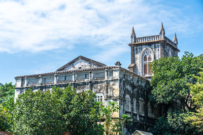 Low angle view of historical building against sky