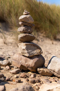 Stack of stones on field